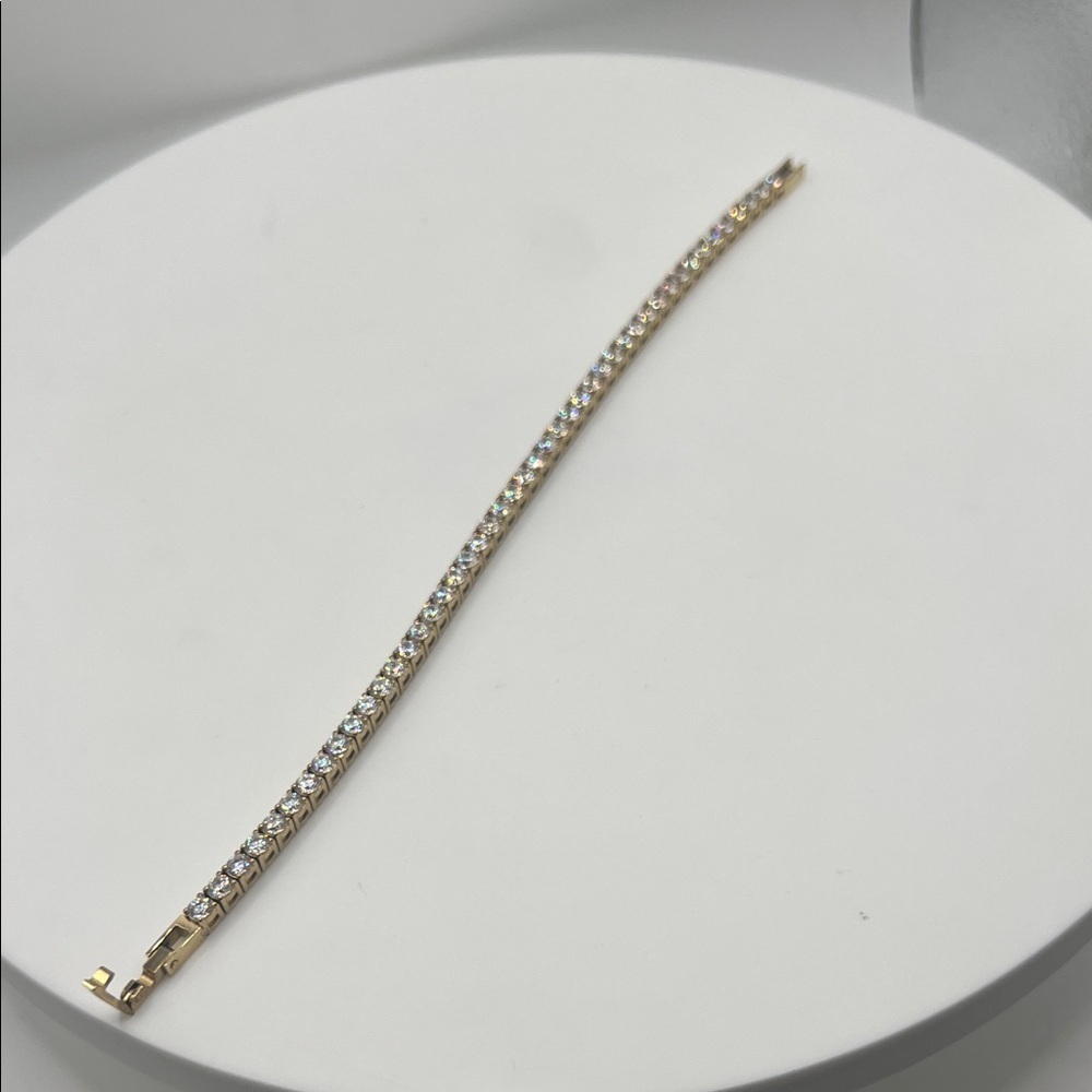 504.Gold Plated over Stainless Steel Tennis Bracelet w/ Swarovski Crystals.